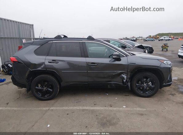 4T3E6RFV0MU057196 2021 TOYOTA RAV4 HYBRID Gray Widok wnętrza z tyłu