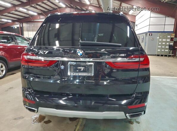 5UXCW2C00L9B06906 2020 BMW X7 Черный Вид салона спереди