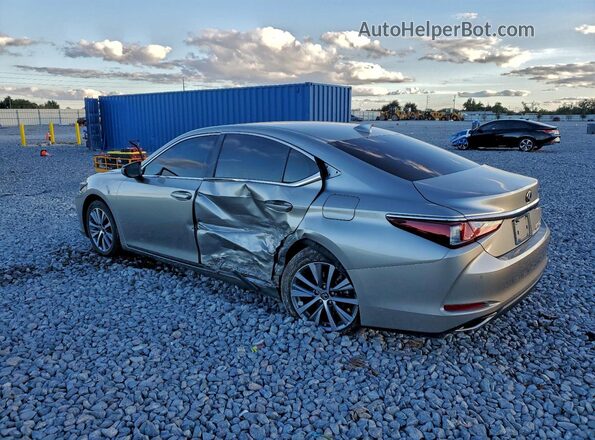 58ADZ1B15MU098643 2021 LEXUS ES Silver Trasero izquierdo
