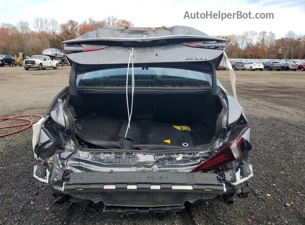 58ADZ1B19LU067670 2020 LEXUS ES Silver Rear view