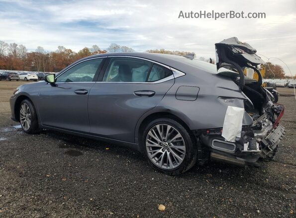 58ADZ1B19LU067670 2020 LEXUS ES Silver Rear left