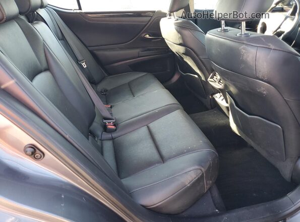 58ADZ1B19LU067670 2020 LEXUS ES Silver Rear seats view
