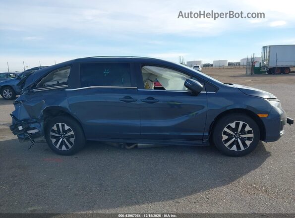 5FNRL6H61SB056964 2025 HONDA ODYSSEY Gray Rear interior view