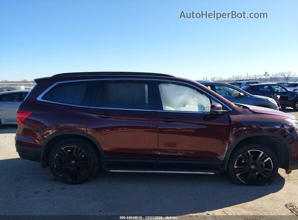 5FNYF5H2XNB005221 2022 HONDA PILOT Maroon Vista interior trasera