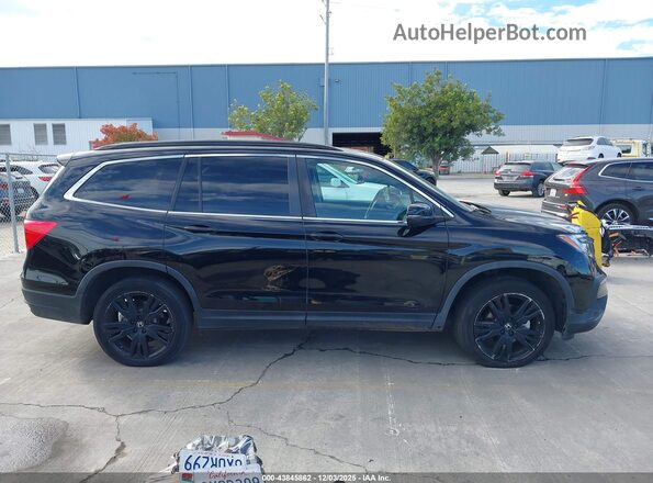 5FNYF6H23MB097650 2021 HONDA PILOT Black Widok wnętrza z tyłu
