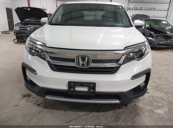 5FNYF6H55LB010937 2020 HONDA PILOT White Rear interior view