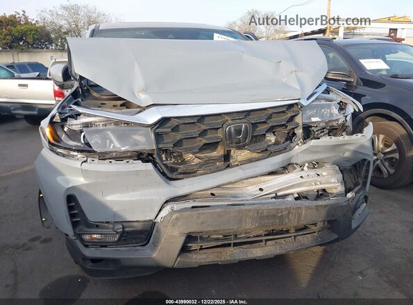 5FNYF8H50PB019286 2023 HONDA PASSPORT Gray Front view