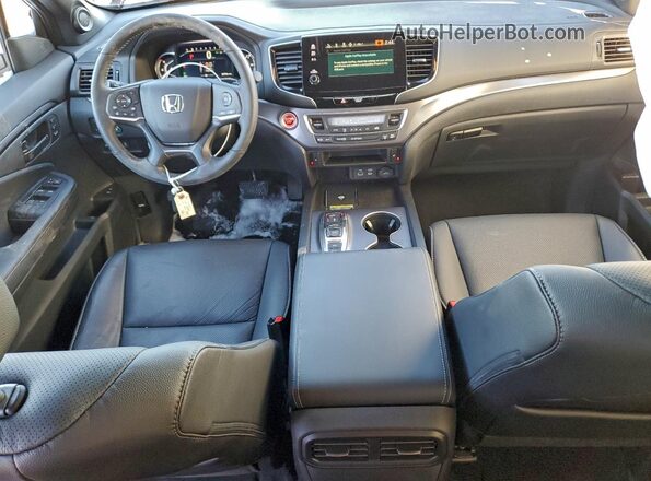 5FNYF8H52SB005012 2025 HONDA PASSPORT Red Widok deski rozdzielczej