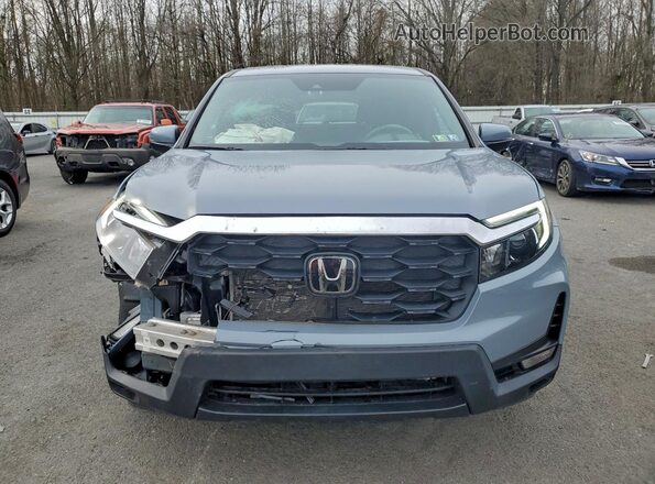 5FNYF8H53PB010923 2023 HONDA PASSPORT Синий Вид спереди