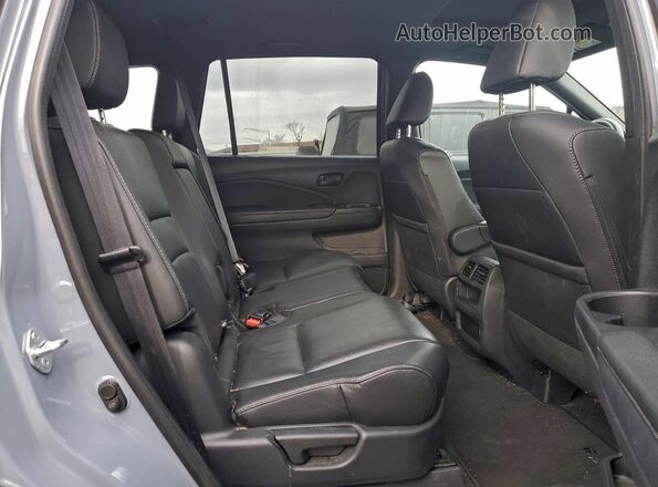 5FNYF8H53PB010923 2023 HONDA PASSPORT Синий Вид задней части салона