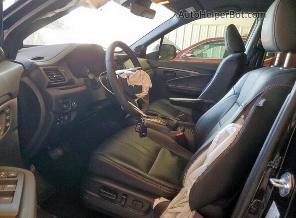 5FNYF8H60PB003145 2023 HONDA PASSPORT Черный Вид салона спереди