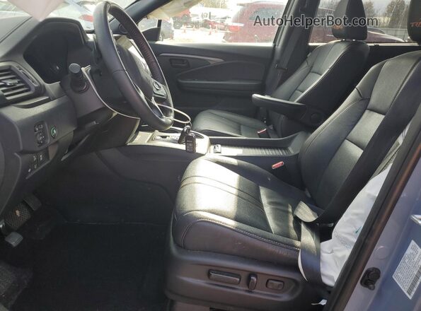 5FNYF8H62PB034297 2023 HONDA PASSPORT Gray Front interior view
