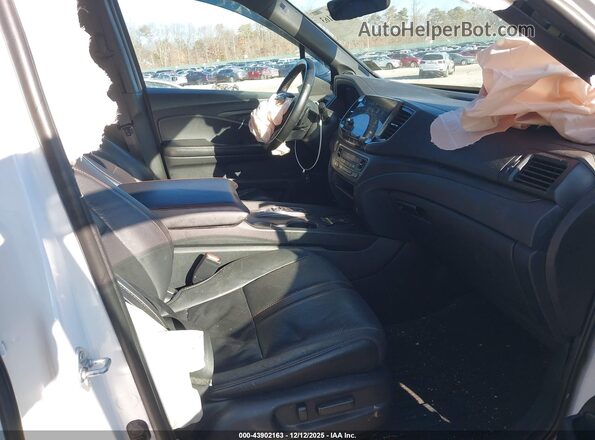 5FNYF8H64RB021702 2024 HONDA PASSPORT White Вид салону спереду