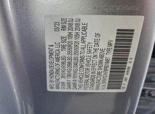 5FNYG1H78PB018487 2023 HONDA PILOT Silver Vista de la etiqueta del VIN