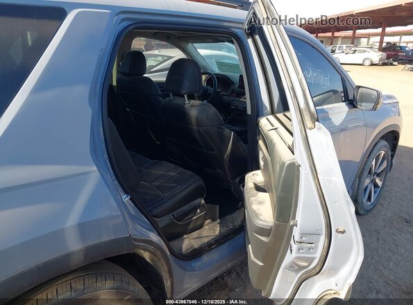 5FNYG2H71PB011399 2023 HONDA PILOT Light Blue Vista de la etiqueta del VIN