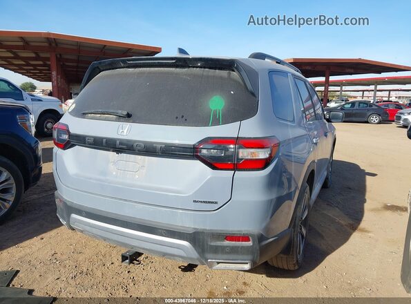 5FNYG2H71PB011399 2023 HONDA PILOT Light Blue Trasero derecho