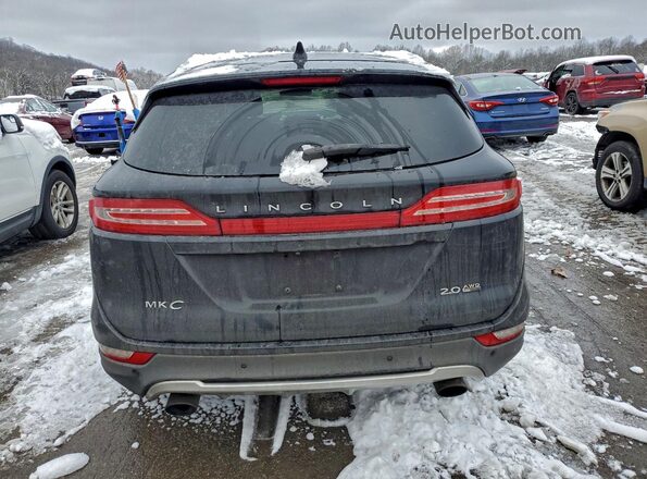 5LMCJ2D99GUJ03105 2016 LINCOLN MKC Черный Вид сзади