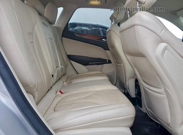 5LMCJ3C91GUJ03171 2016 LINCOLN MKC Серебряный Вид задней части салона
