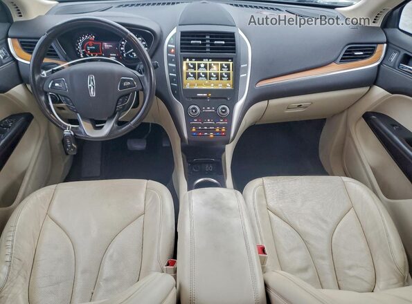 5LMCJ3C91GUJ03171 2016 LINCOLN MKC Серебряный Вид панели приборов
