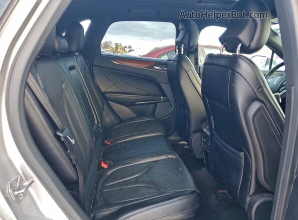 5LMCJ3D95GUJ00174 2016 LINCOLN MKC Silver Vista interior trasera