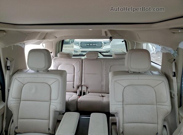 5LMJJ2LT3LEL15281 2020 LINCOLN NAVIGATOR White Rear seats view
