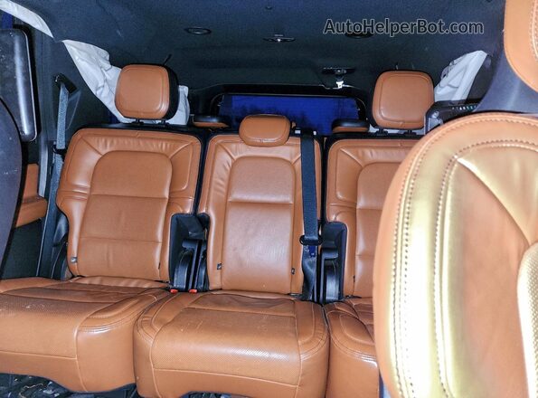 5LMJJ3LTXLEL23481 2020 LINCOLN NAVIGATOR White Rear seats view