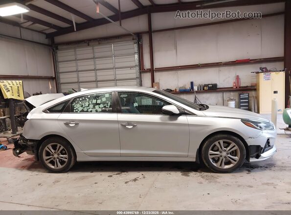 5NPE34AF7JH670088 2018 HYUNDAI SONATA Silver Вид задньої частини салону