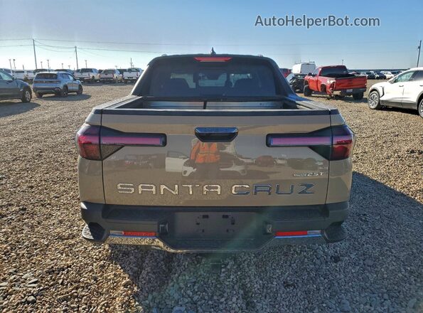 5NTJEDAF9RH080318 2024 HYUNDAI SANTA Tan Rear view