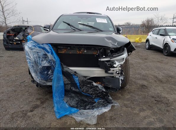5TDAAAB60SS046775 2025 LEXUS TX 350 Black Սալոնի հետևի տեսք
