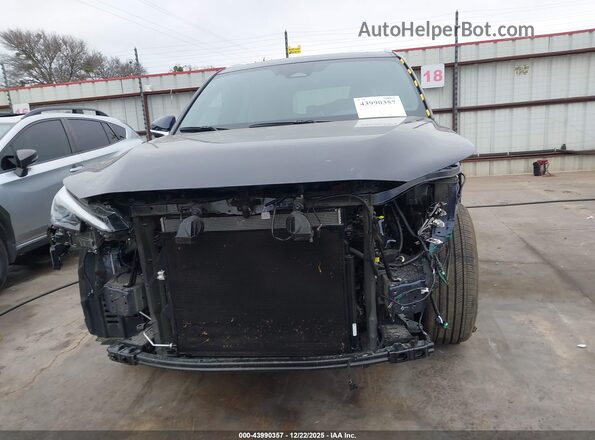 5TDAAAB66SS042505 2025 LEXUS TX 350 Dark Blue Вид задньої частини салону