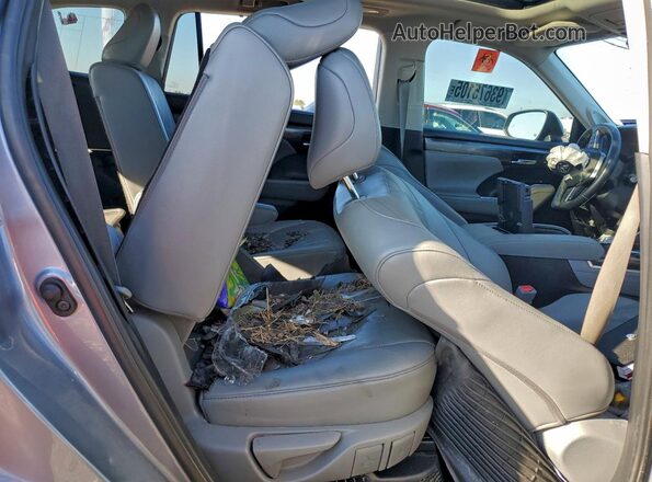 5TDFARAHXMS010988 2021 TOYOTA HIGHLANDER HYBRID Silver Vista interior trasera