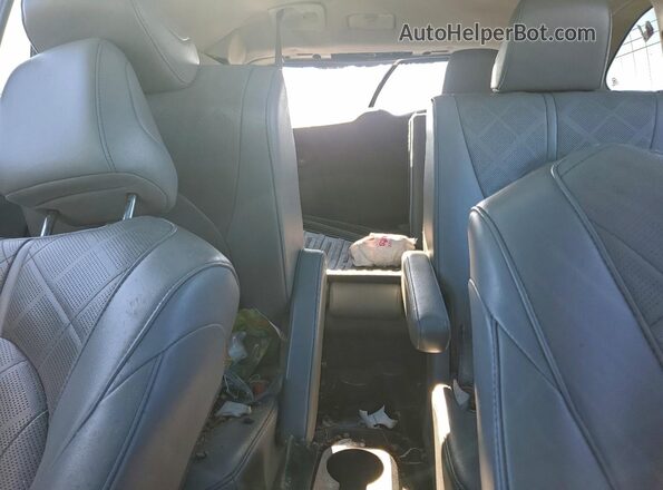 5TDFARAHXMS010988 2021 TOYOTA HIGHLANDER HYBRID Silver Vista de los asientos traseros