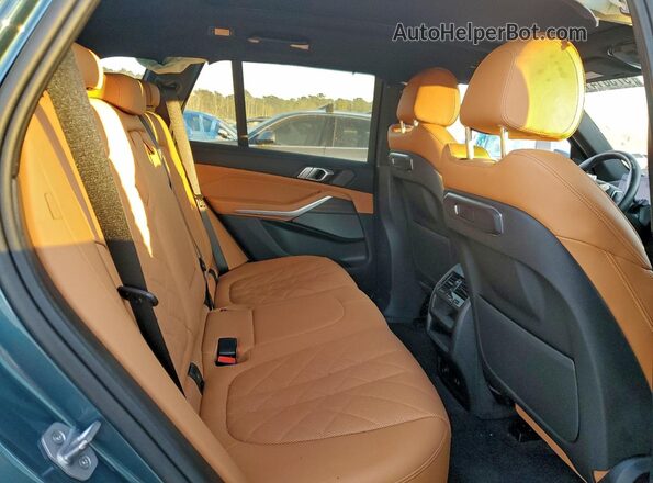 5UX13EU00R9V51734 2024 BMW X5 Teal Rear seats view