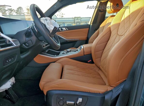 5UX13EU00R9V51734 2024 BMW X5 Teal Front interior view