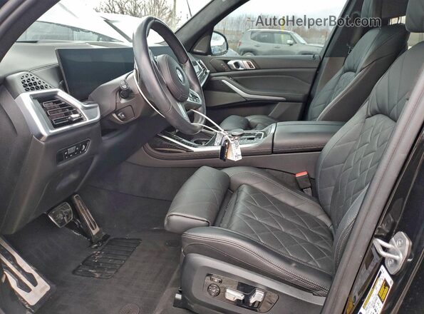 5UX23EM04P9P64302 2023 BMW X7 Черный Вид салона спереди