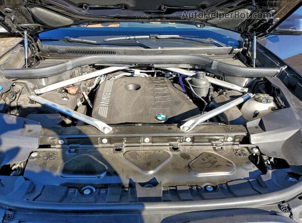 5UX23EM05R9U65971 2024 BMW X7 Blue Engine compartment view