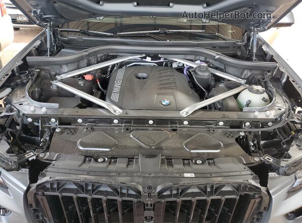 5UX23EM05T9102044 2026 BMW X7 Gray Սալոնի հետևի տեսք