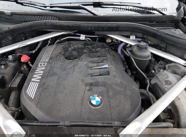 5UX23EM07R9T59490 2024 BMW X7 Черный Вид сзади