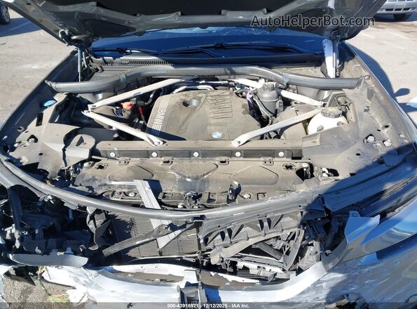 5UX23EM0XP9P00328 2023 BMW X7 Gray Widok z tyłu
