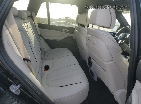 5UX23EU00R9V81496 2024 BMW X5 Blue Rear seats view
