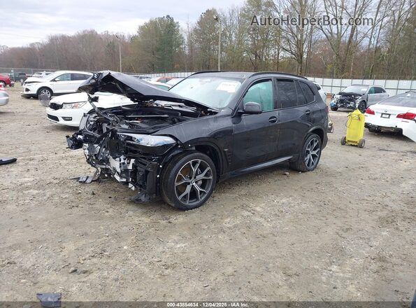 5UX23EU01T9055997 2026 BMW X5 Black Առջևի ձախ երեք քառորդ տեսարան
