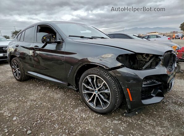 5UX2V1C03L9C01100 2020 BMW X4 Black Delantero derecho