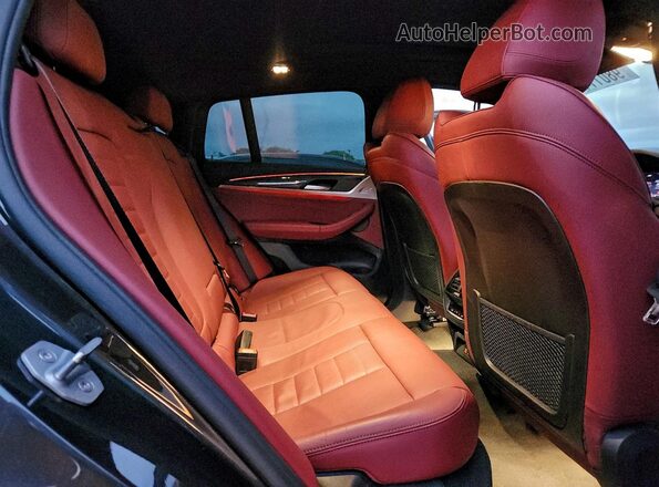 5UX2V1C03L9C01100 2020 BMW X4 Black Vista interior trasera