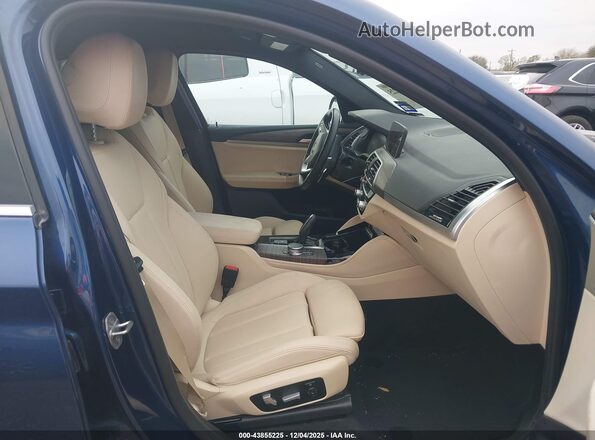 5UX2V1C03LLE67431 2020 BMW X4 Синий Вид салона спереди