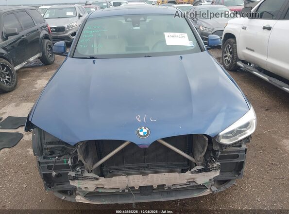 5UX2V1C03LLE67431 2020 BMW X4 Синий Вид задней части салона