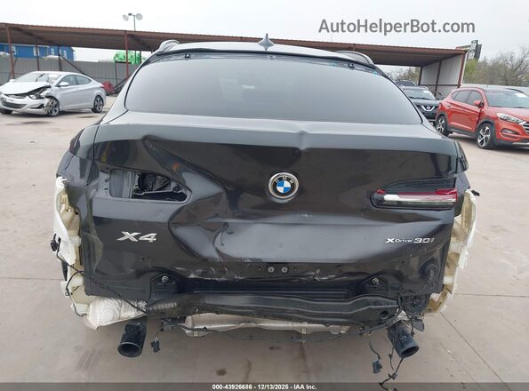 5UX2V1C05M9F04672 2021 BMW X4 Black Դիմացի տեսք