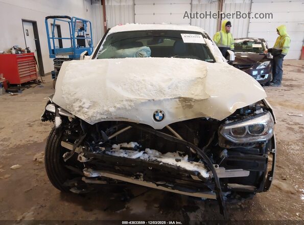 5UX2V1C06M9H07053 2021 BMW X4 White Front view