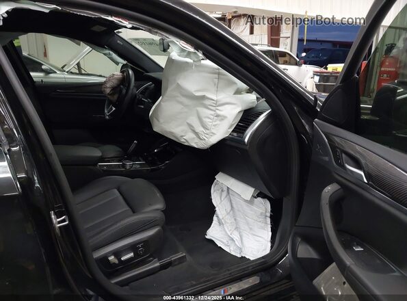 5UX2V1C08L9C45867 2020 BMW X4 Черный Вид салона спереди