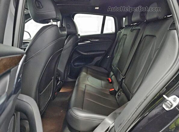 5UX33DT02N9M98730 2022 BMW X4 Черный Вид салона спереди