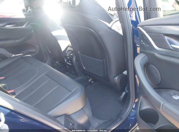 5UX33DT07R9X51868 2024 BMW X4 Blue Vista de la etiqueta del VIN